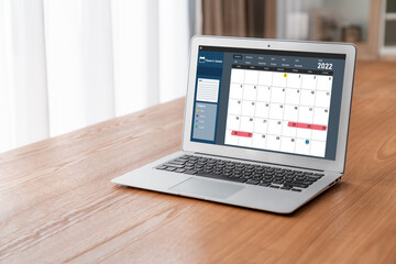 Wall Mural - Calendar on computer software application for modish schedule planning for personal organizer and online business