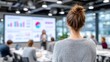 © Berkah6 - Woman Delivering Presentation in Modern Conference Room with Graphs and Charts on Screen with Cinematic Lighting and Blurred Audience Perspective