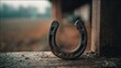 © Zarana  - Horseshoe symbolizing luck rustic barn photography natural lighting close-up farm life