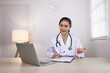 © SOMKID - Medical professional using a computer for online patient support, Medical professional and Healthcare technology Concept.