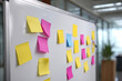 © inas - Whiteboard with colorful sticky notes and markers in modern office meeting room