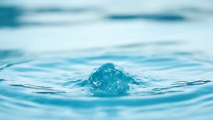 Wall Mural - A serene slow motion water splash captured as delicate spray rises and falls into a pristine clear pool, emphasizing purity and calm water, reflection, pure