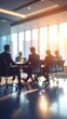 © cvdr - People in Suits Meeting at Table With Sunlight Streaming Through Windows
