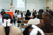 © EduLife Photos - Students Listening to Teacher Presentation in Classroom