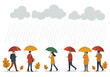 © firman - People walk in the rain with umbrellas under gray clouds