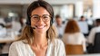 © Johannes - call center agent with headset working on support hotline in modern office with copy space portrait of mature positive agent in conversation with customer over headset looking at camera no logos no b