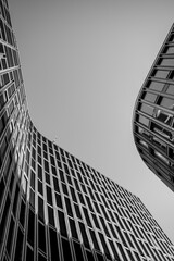 Black and white photograph of curved modern facades in Oslo Norway, minimalist clarity background with architectural detail for branding and editorial layouts