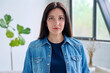 © Valerii Honcharuk - Headshot portrait of serious woman 30 years old inside room at home