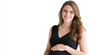 © britaseifert - Smiling Pregnant Woman with Hands on Belly Against before a White Background