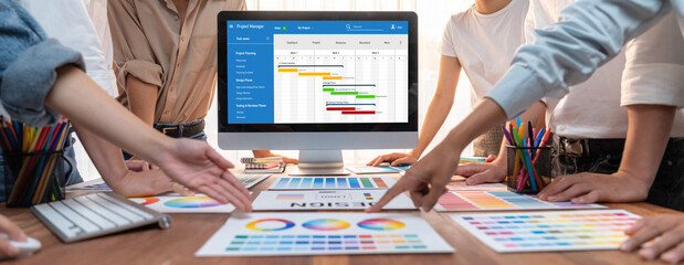 Wall Mural - Project planning software for brisk business project management on the computer screen showing timeline chart of the team project