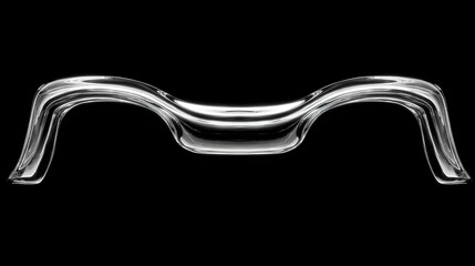 Abstract, polished metallic shape with curves and contours against a stark black backdrop