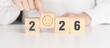 © Jo Panuwat D - 2025 end year to Happy New Year 2026 with Smile block. Satisfaction, feedback, Review, mental health, eco sustainable and good year concept