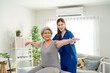 © Kawee - Elderly Asian woman receive physical therapy with support of caregiver.