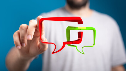 Conceptual shot symbolizing dialogue, communication, and interaction, with a man touching 3D speech bubbles. Focus on connection and messaging.