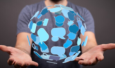 A person presents digital communication bubbles, showing social connection and technology in a digital world.