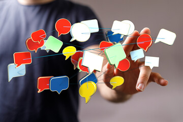 An image representing communication, social interaction, networking, and online conversation through message bubbles.
