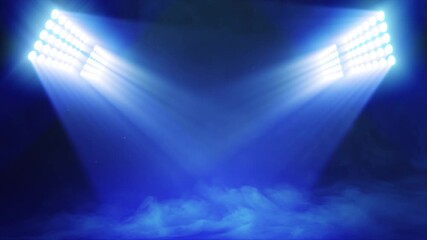 Wall Mural - Animated sports graphic background plate, with bright banks of floodlights shining dramatic volumetric light over a misty, atmospheric scene, in deep blue color palette