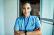 © Marko Geber - Healthcare professional in blue scrubs