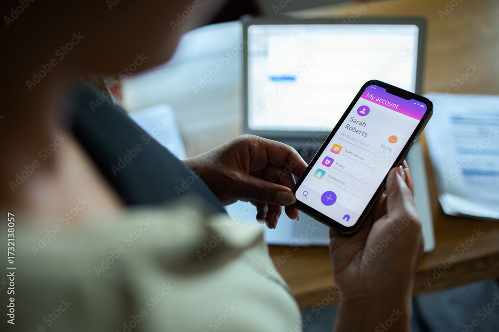 Person using mobile banking app Stock Photo | Adobe Stock