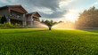 © Thai - Automatic irrigation sprinkler system watering lush green grass in a residential home garden, modern landscaping technology ensuring healthy lawn care, efficient watering, and eco-friendly maintenance