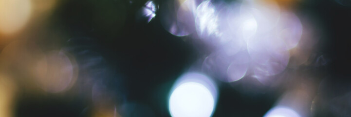Wall Mural - Blurred lights abstract background, banner texture. Holiday defocused bokeh header. Wide screen wallpaper. Panoramic web banner with copy space for design