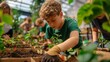 © Cdel - Child exploring soil in garden, young boy engaged in planting activities, surrounded by greenery and nature's textures.