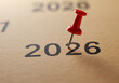 © Rizwan Akbar - Future planning image showing a vibrant red pushpin placed directly onto the bold number 2026.