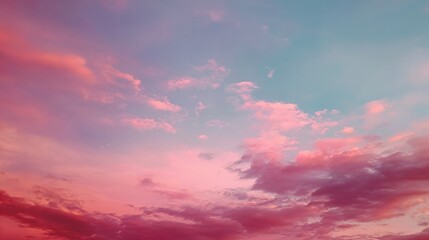 Wall Mural - Serene Twilight Sky with Soft Pink and Blue Tufts of Clouds