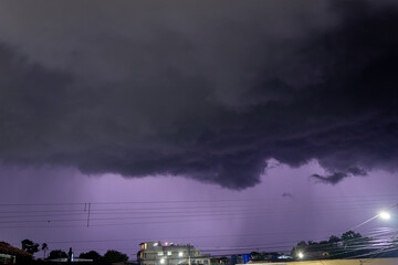 Wall Mural - thunder storm in the city at night