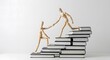 © Hisamsyah - Support, Tutoring, and Coaching Wooden Figures on a Staircase of Books, Symbolic of Education