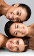 © Prostock-studio - Three Diverse Ladies With Perfect Faces And Skin Posing Together Smiling To Camera On Gray Background. Beauty Concept. Vertical