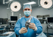 © HelalUddin - Professional stock photo of a surgeon holding a new cobalt-chromium knee joint implant, presenting it to the camera.