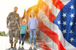 © New Africa - Military man and his family outdoors, double exposure with national flag of USA