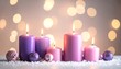 © Bujang - Festive purple candles and ornaments on snow
