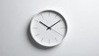 © bento - Minimalist white analog wall clock with black hands and tick marks, showing time 4:08:00, mounted on light gray wall with subtle shadow.