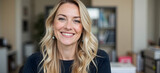 beautiful blonde smiling woman in the office