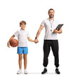© Ljupco Smokovski - Basketball coach and boy holding hands and posing together