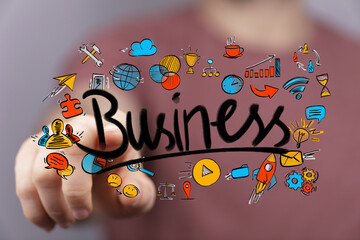 Dynamic image showing a hand interacting with 'Business' text and a vibrant array of interconnected icons representing growth, strategy, and inn