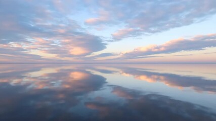 Wall Mural - Abstract patterns of a cloudy sky subtly reflected on a still, undisturbed water surface at dawn serene, blue, still