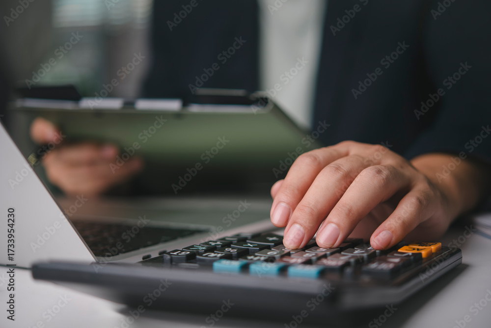 Accountant hand using calculator business finance, calculating tax ...