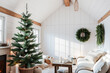 © Evgenii Starkov - Festive Christmas Tree in Cozy White Interior Living Room