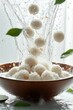 © Pat J. - khanom bua loy flying with coconut milk and taro balls, isolated on white background