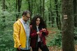 © dsheremeta - Father daughter hiking forest using smartphone navigation