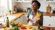 © Rafael - Culinary Joy: A radiant person relishes the pleasures of preparing a fresh, healthy meal in a bright, modern kitchen, surrounded by colorful vegetables and the tools of her craft.