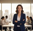 © picturehome - Confident mid adult business woman smiling in office
