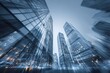 © Fauzi - Low-angle shot of a cluster of towering skyscrapers with a blurry, artistic effect