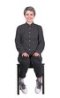 © 1STunningART - Full length portrait of a young woman sitting on a chair waiting as keeps hands on knees. Businesswoman job recruitment and employment concept. Seated female isolated on transparent background