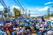 Many motorbikes motorcycles waiting at the airport on Phuket Thailand.