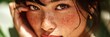 © Agung - Close-up portrait of a young woman with natural freckles and a serene expression.