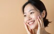 © li - Two Asian woman with beauty face touching healthy skin care on beige background. High quality